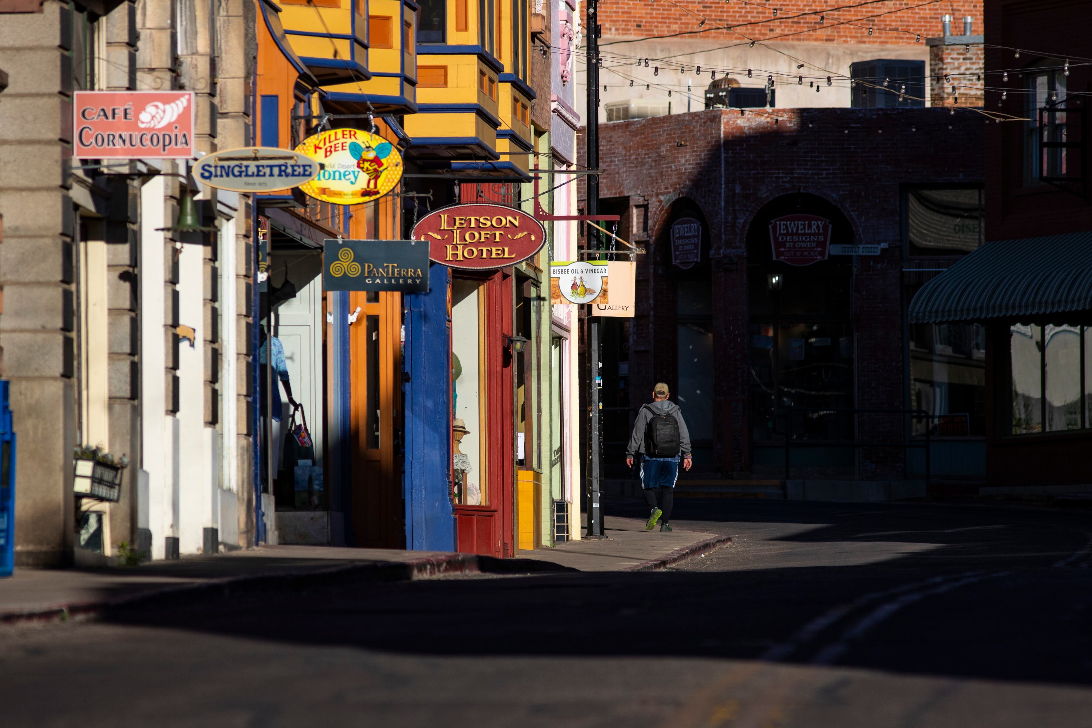 man walks on street