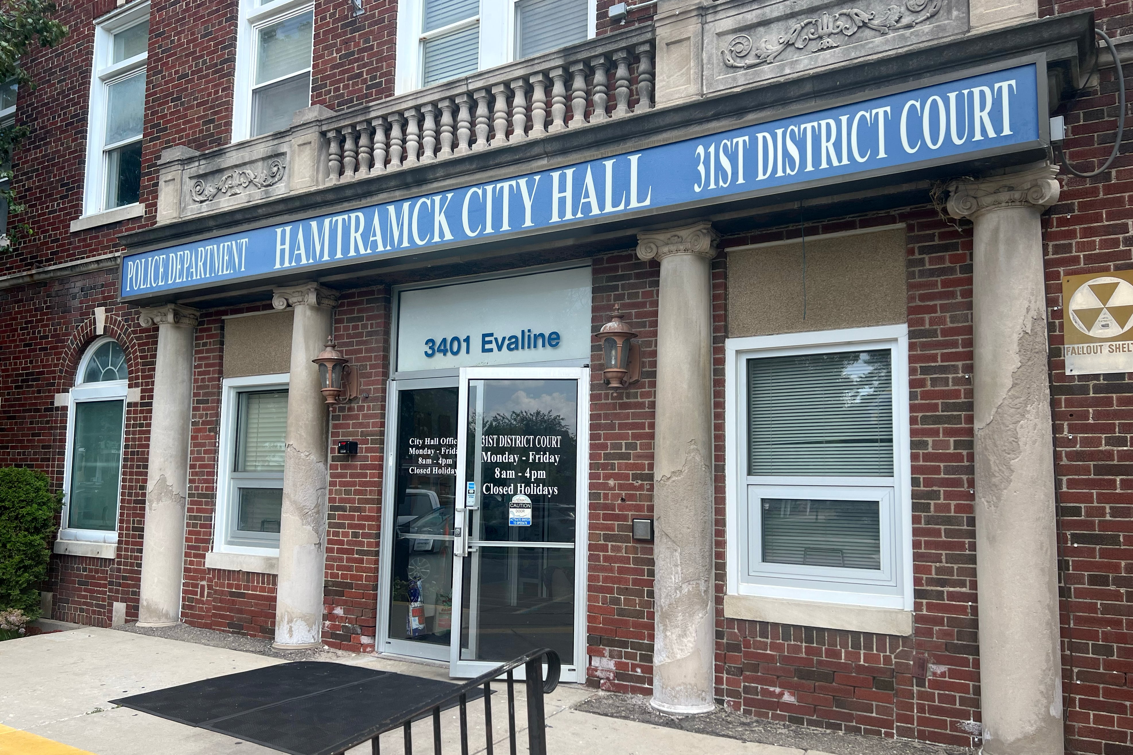 A photograph of the outside of a brick building.