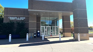 Michigan judge throws out double-voting charges against poll worker and voter