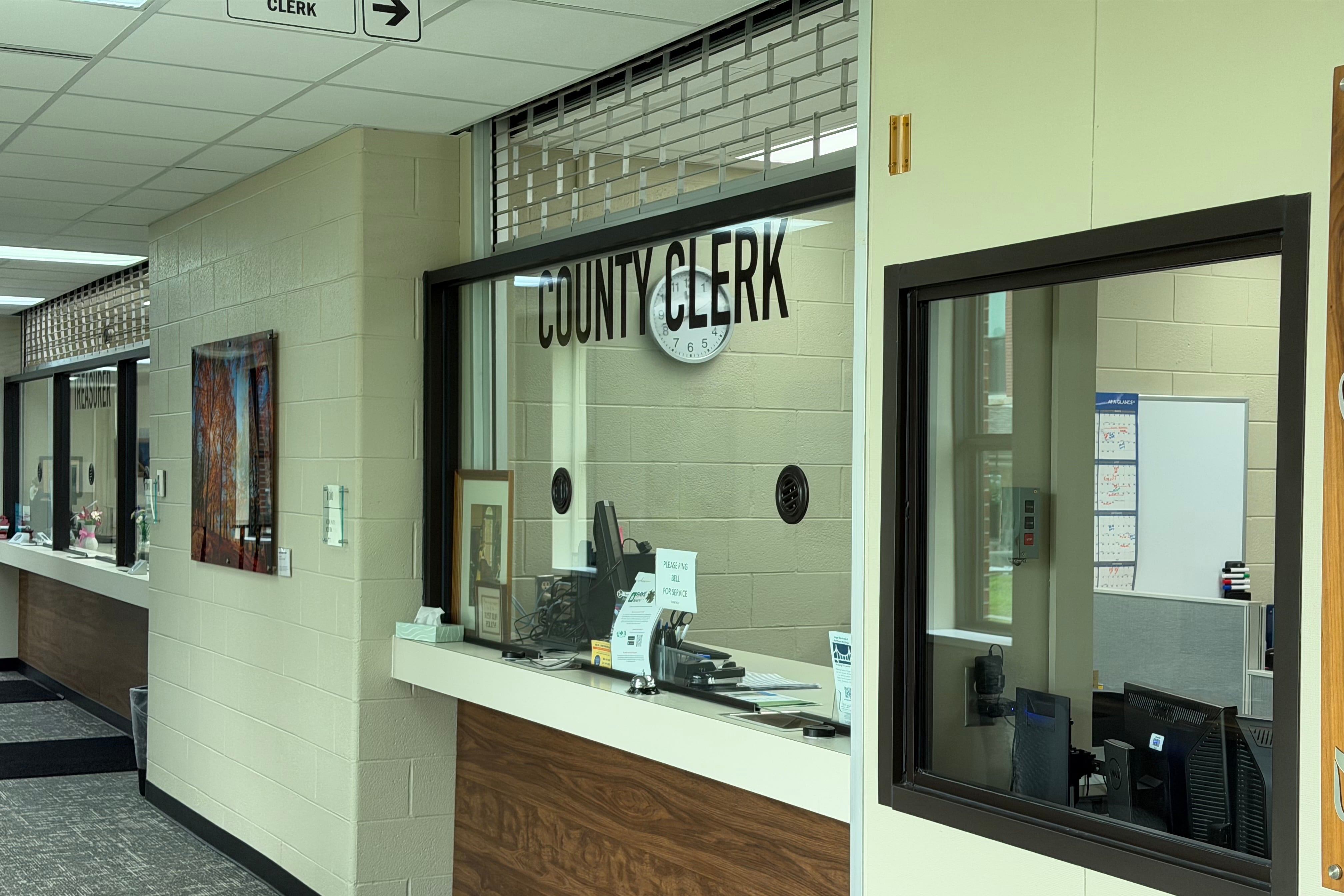 A county clerk's front office in a hallway.