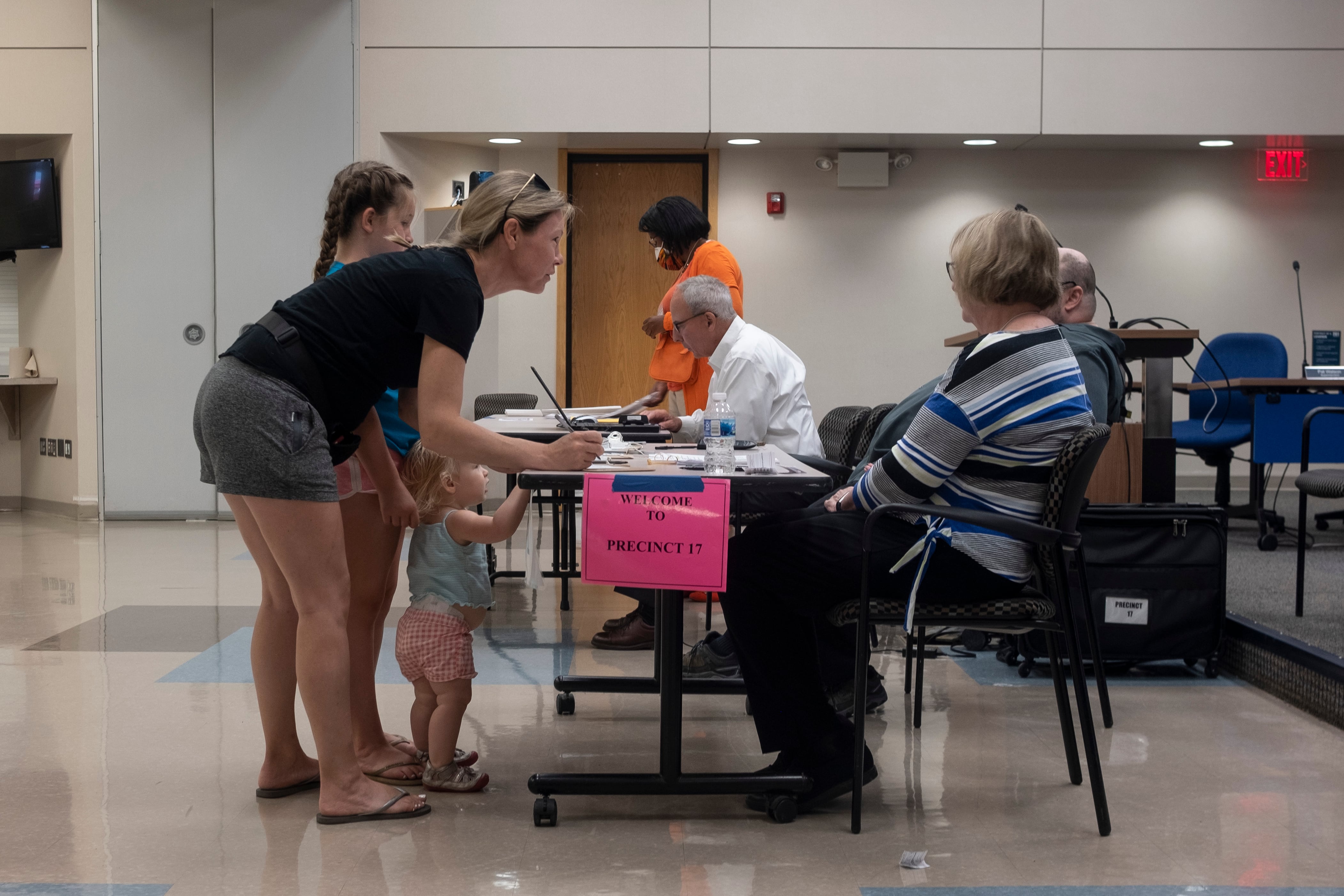 Michigan residents cast their ballots in the primary election on Aug. 2, 2022 in Bloomfield Hills.