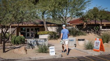 Under new law, Arizona cities and town clerks must open on weekend before election. No one knows why. 