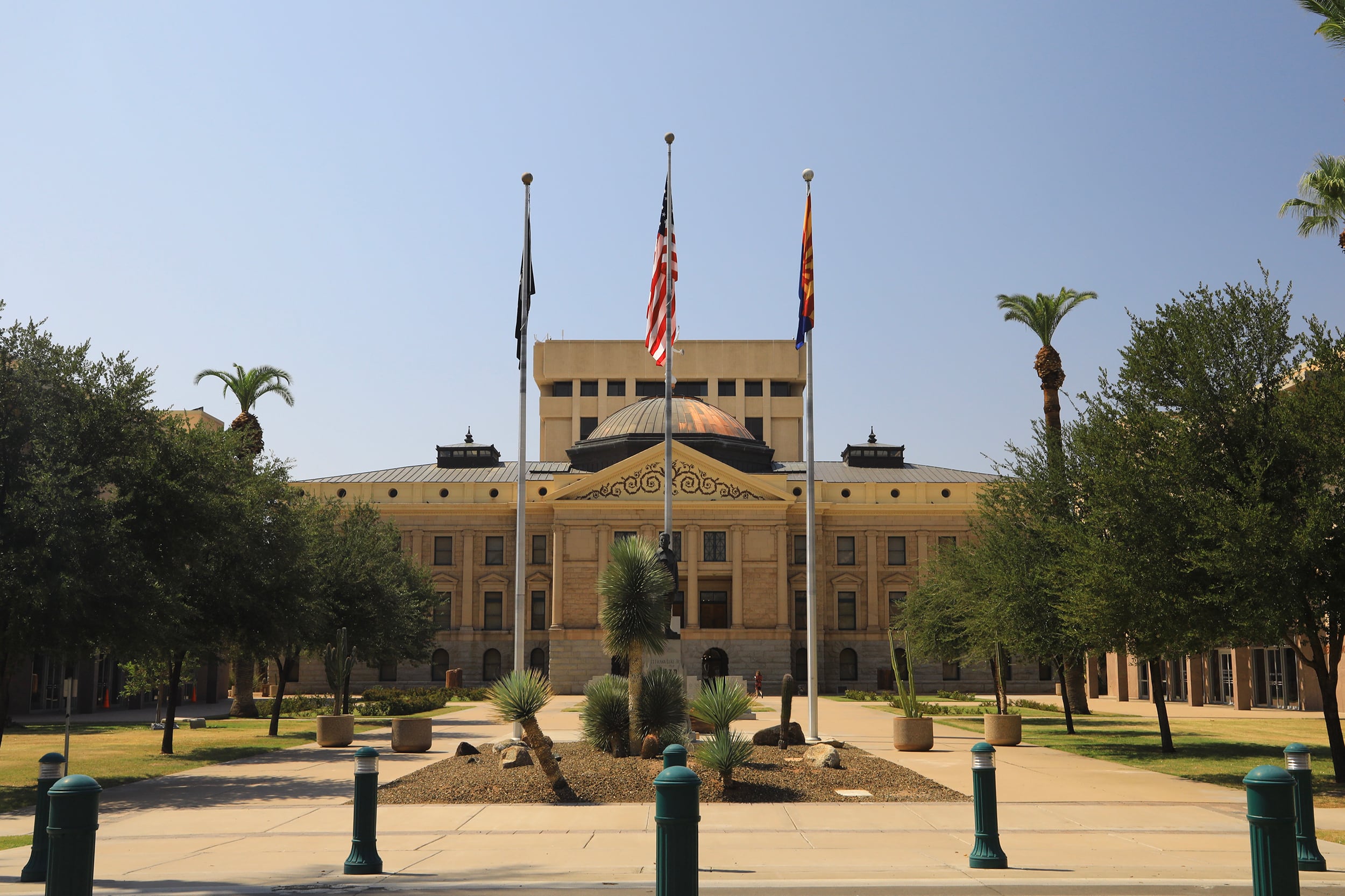A photograph of the Arizona State Capital Complex on a sunny day with no clouds in the sky.