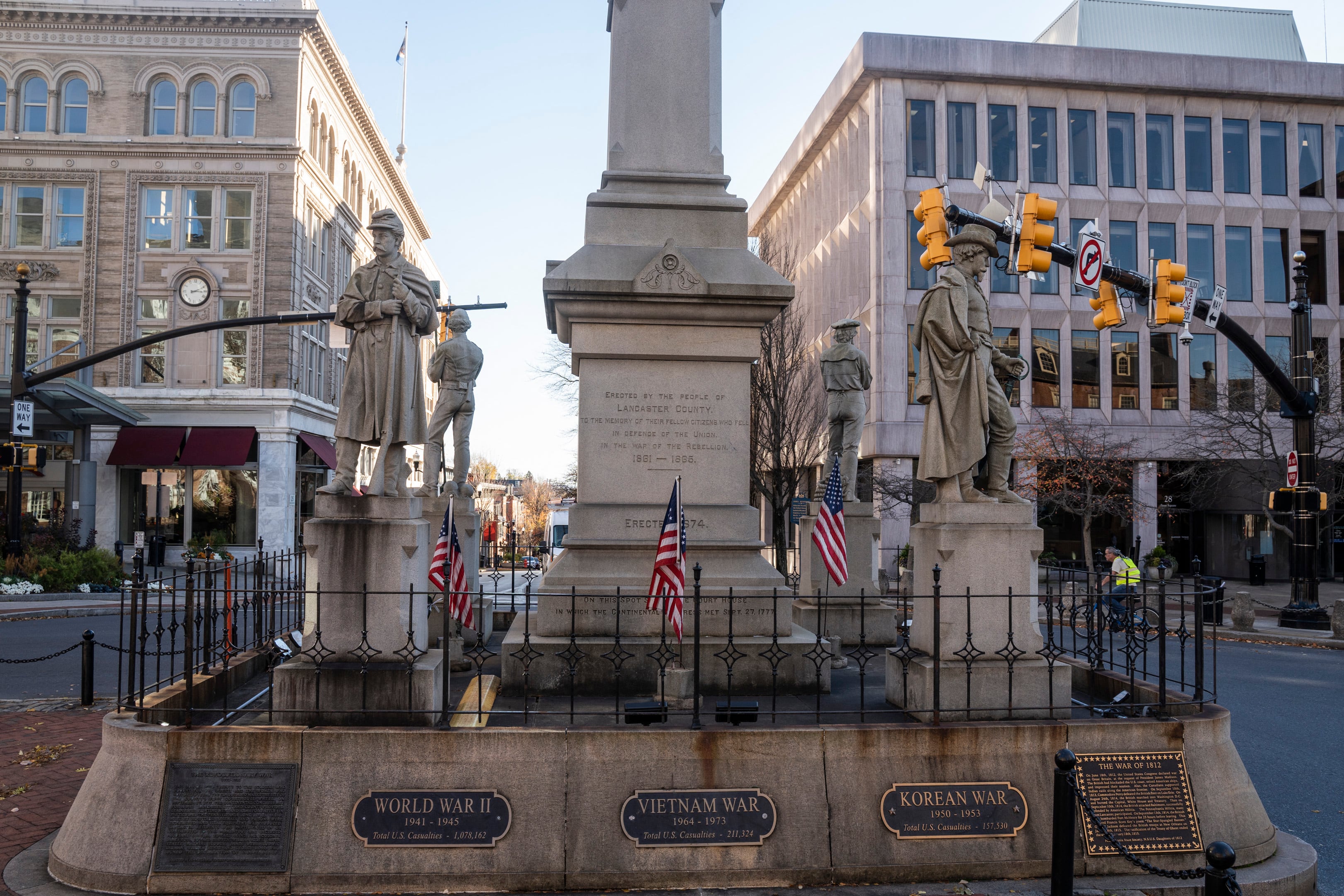 Monuments are part of a downtown street scene.