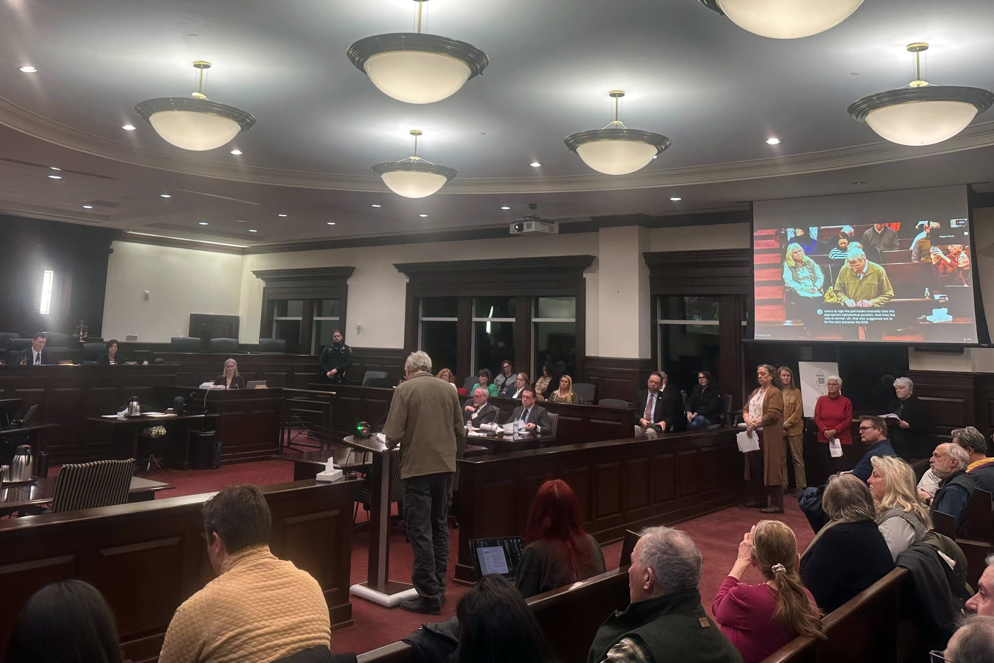 A photograph of a large meeting room.