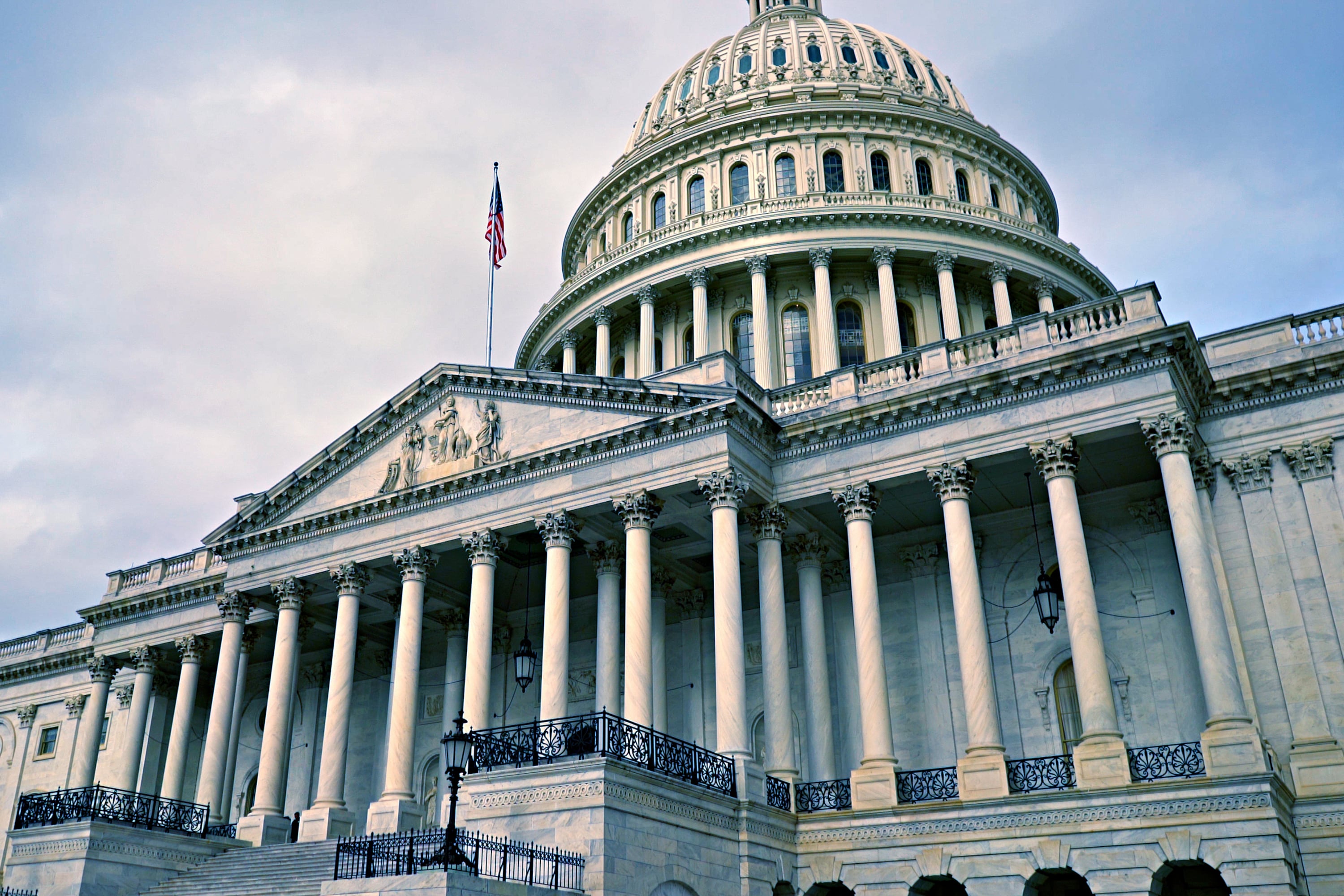 A building with white columns and a dome.